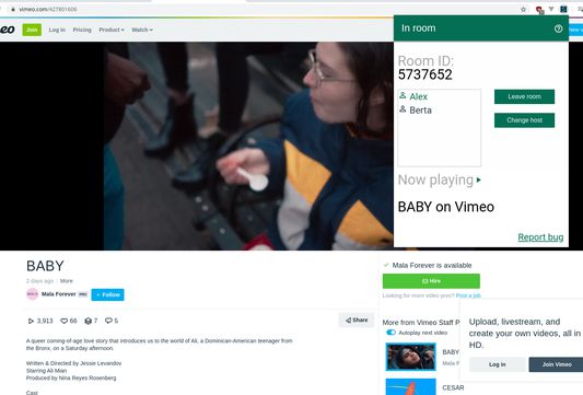 Two friends watching vimeo together